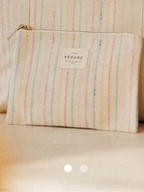 Sézane Cream Cosmetic Pouch with Pastel Stripe Accents